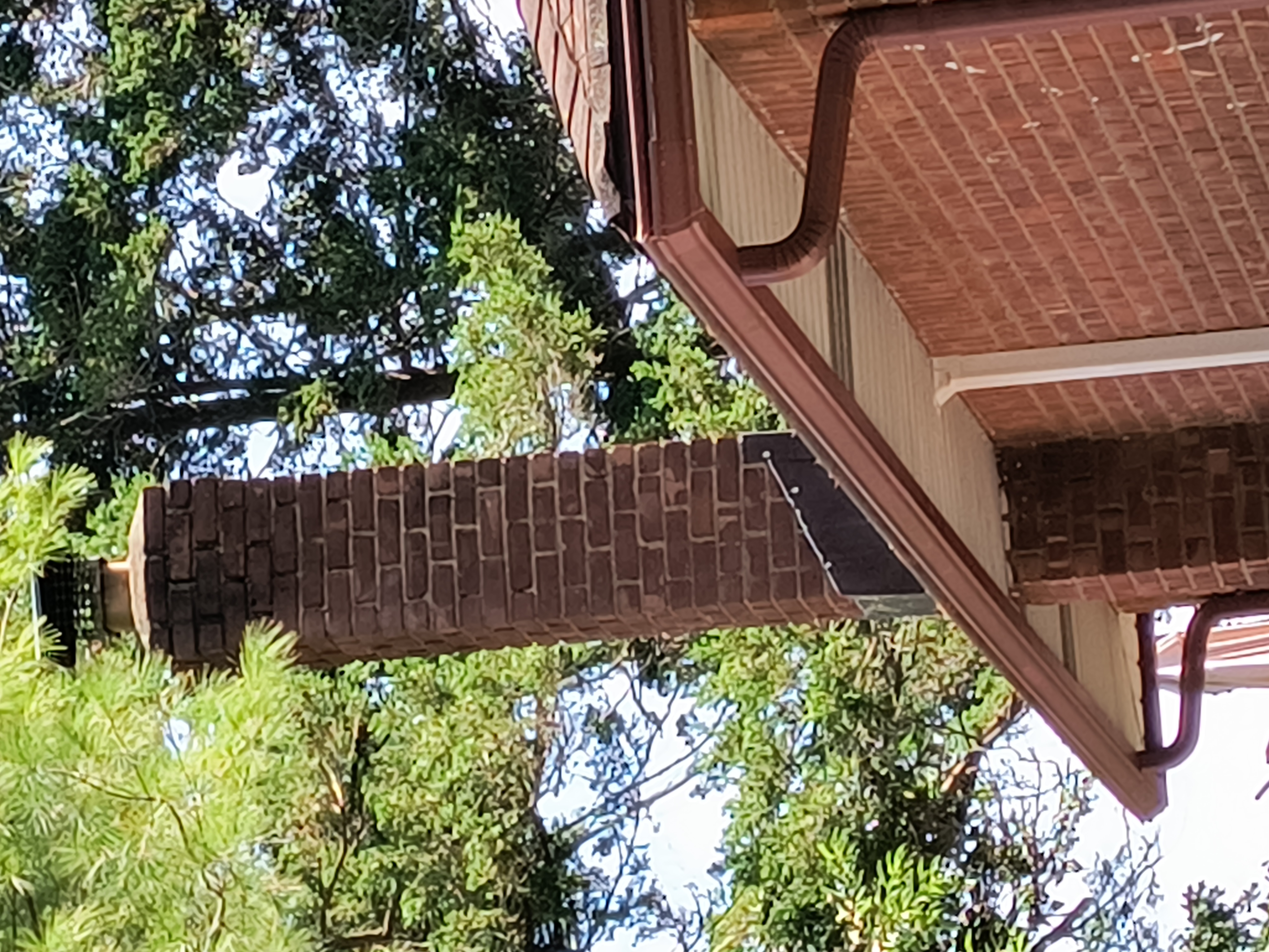 Before and after professional chimney cleaning in East Islip, NY
