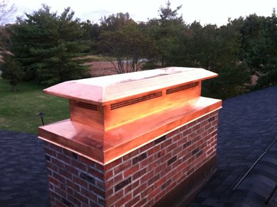Before and after chimney cap replacement in East Islip, NY