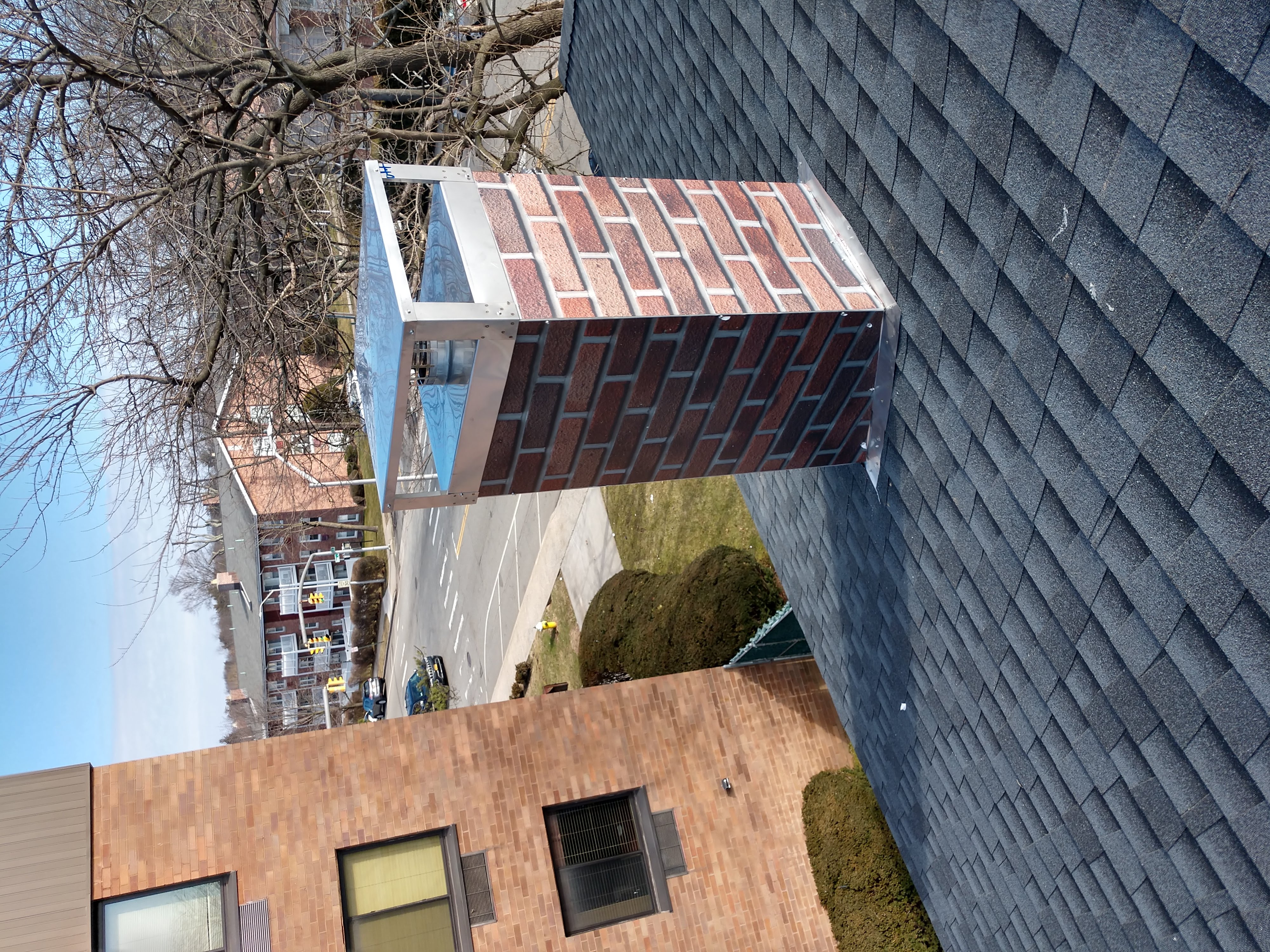 New elastomeric sealant applied to chimney crown in East Islip, NY