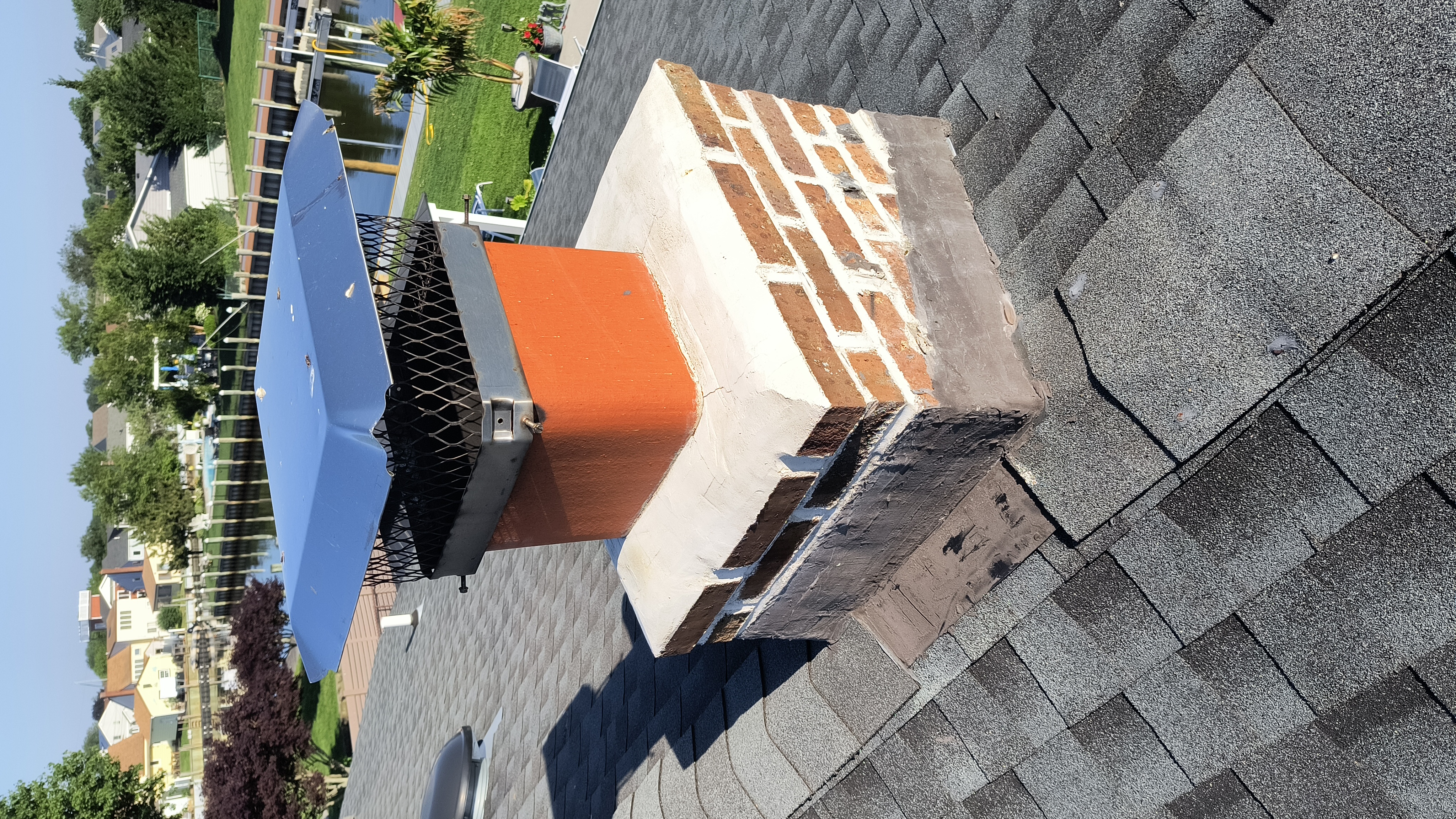 Full chimney masonry rebuild and restoration in East Islip, NY