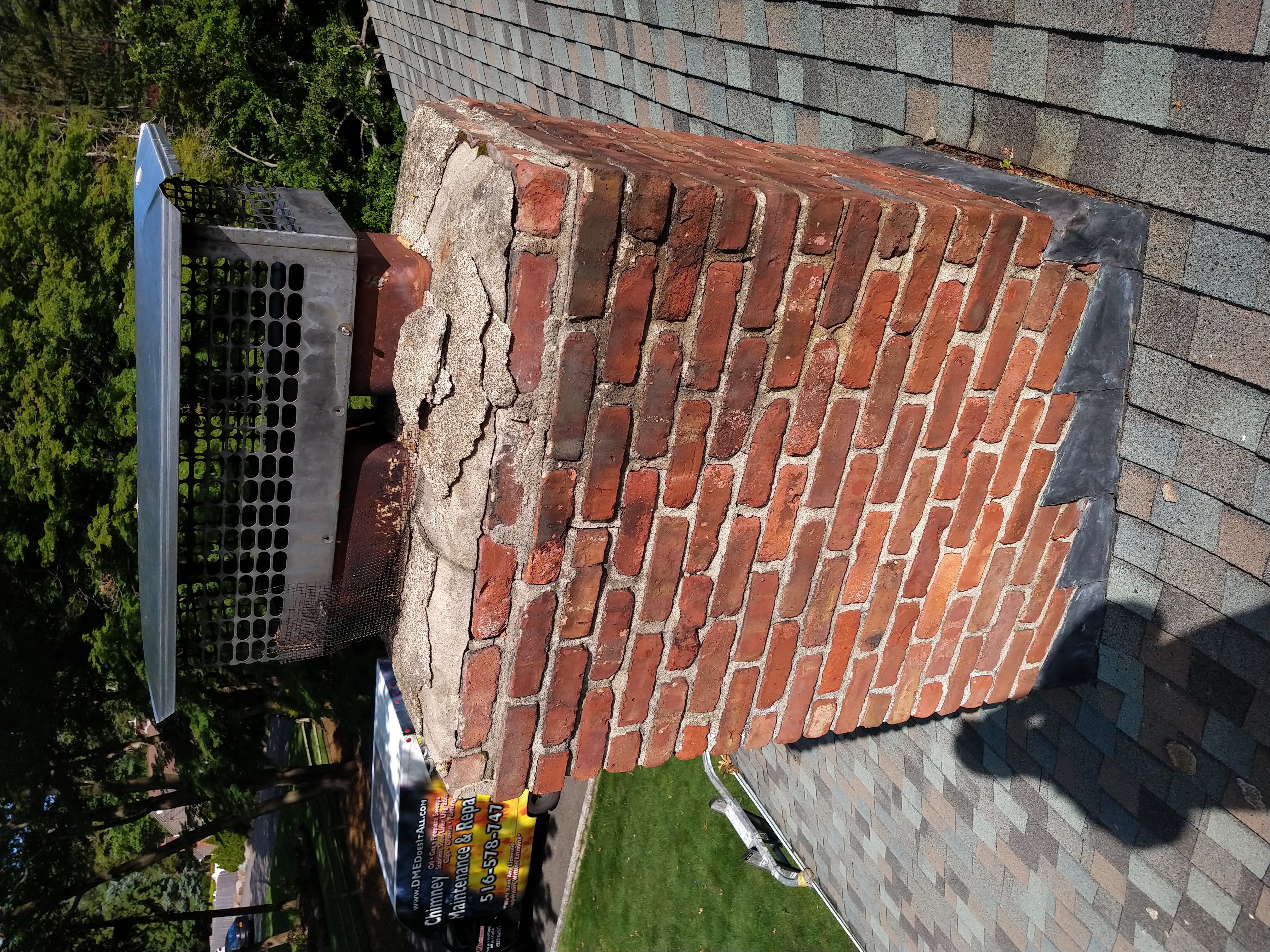 Cracked chimney crown professionally repaired in East Islip, New York
