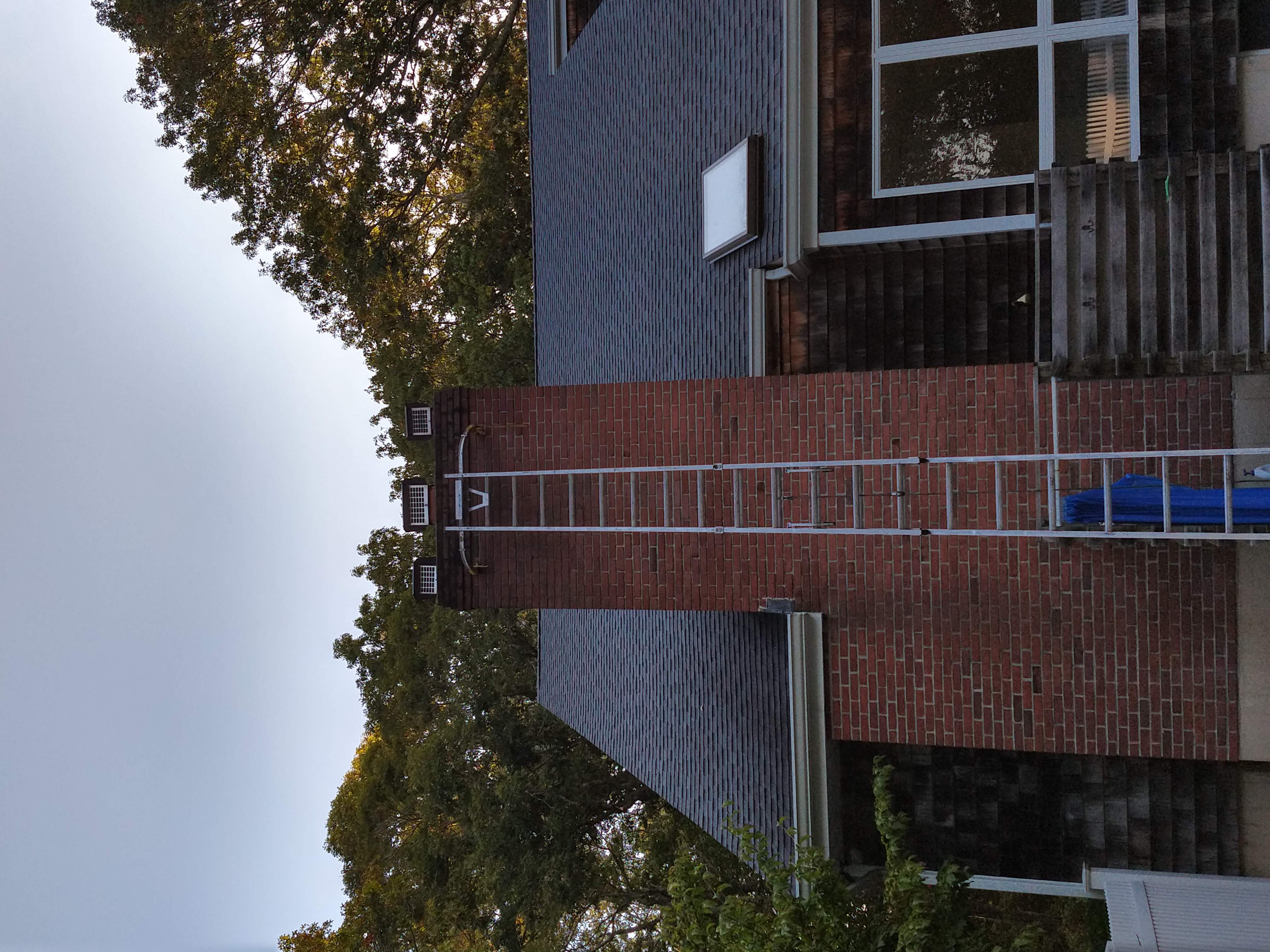 Draft-reducing chimney damper fixing heat loss in East Islip, NY