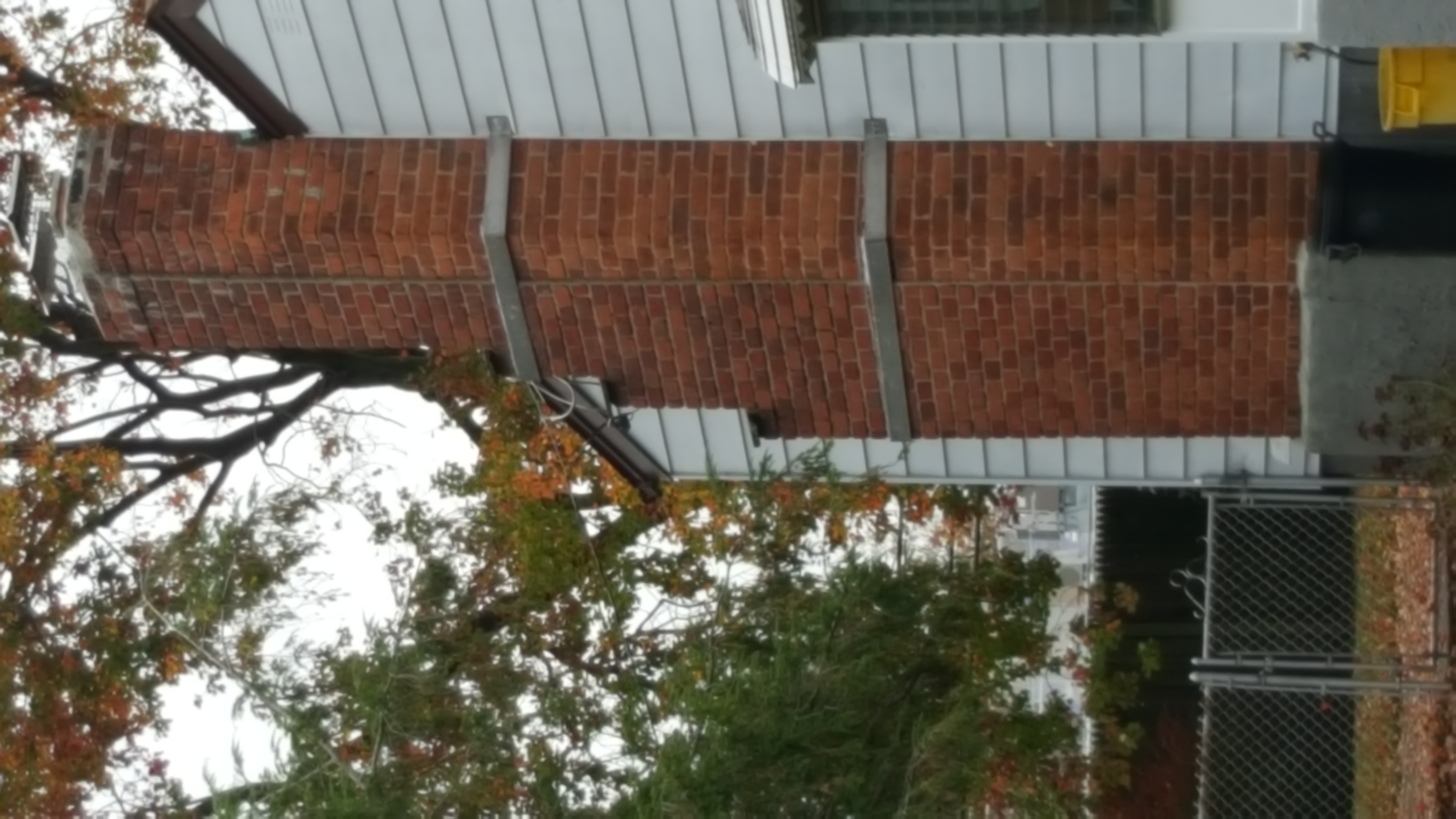 Heavy oil soot removal from chimney flue in East Islip, New York